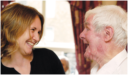 Women and Man laughing together